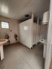 1 - ITEM Park Home restroom, 6m x 2,5m.One door missing.Splitted in 3 x compartments.Left compartment fitted with 2 x toilets,2 x hand baisins,2 x urinals.Middle compartment fitted with 1 x toilet and 1 x hand basin. Right and side compartment fitted w - 5