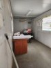 1 - ITEM Container Storage 12M with content , 1 x side door fitted,Furniture inside container - 4 x desks & 15 chairs,content inside to be sold with the container,Condition Fair - 5