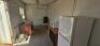 1 x 6M Office Container with content (Fridge, table, office chair, cupboard and microwave). - 4