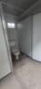 1 x 12m shipping container converted for toilet facility,Condition poor,Floor and floorboards damaged,Toilets and basins damaged - 3
