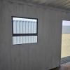 1 X 6M SHIPPING CONTAINER WITH DOOR AND WINDOWS WITH ELECTRICAL INSTALLED STOCK NR: 1586 - 4