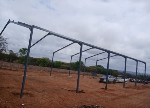 1 X Steel structure 10x30x3.3m
12 columns 15x100 IPE
12 raftees 140 x70 IPE Bloemfontein onsite