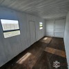 1 X 6M SHIPPING CONTAINER WITH DOOR AND WINDOWS STOCK NR: 1724 - 8
