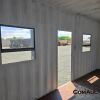 1 X 6M SHIPPING CONTAINER WITH DOOR AND WINDOWS AND ELECTRICITY STOCK NR: 1587 - 17