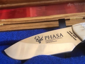 LOT 28 Hunting knife with the PHASA logo.