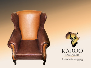 LOT 35 Beautiful genuine leather cognac back Wingback Chair