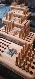 LOT 41 2x Reloading Boards & 2x Ammo Cases. 2x 50 or 2x 100 Hole Reloading boards (winning bid's choice of holes and calibre). 2x Standard calibre 50 Hole Ammo Case. 